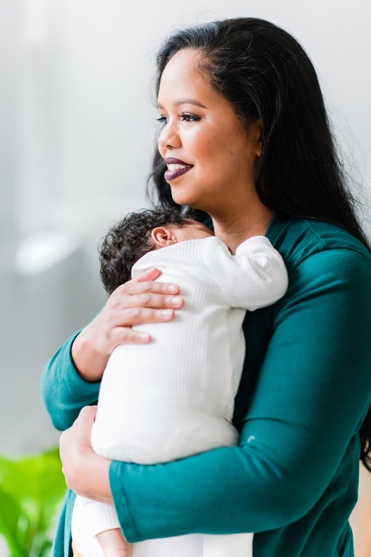 Mother holding her baby