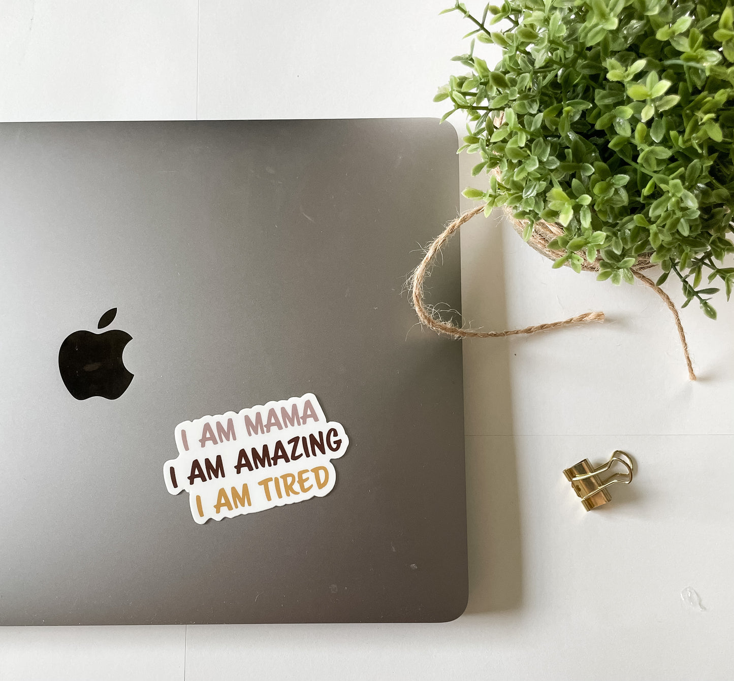I Am Mama, I Am Amazing, I Am Tired vinyl sticker pictured on laptop