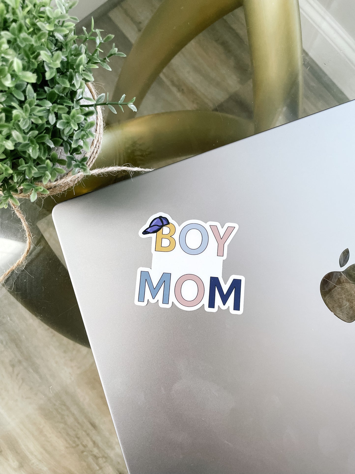 boy mom sticker pictured on laptop