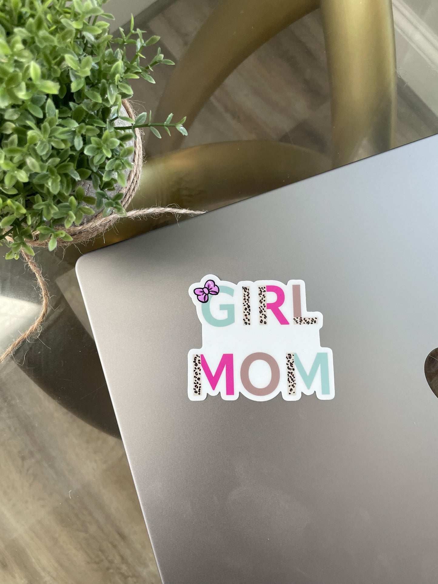 girl mom sticker pictured on laptop