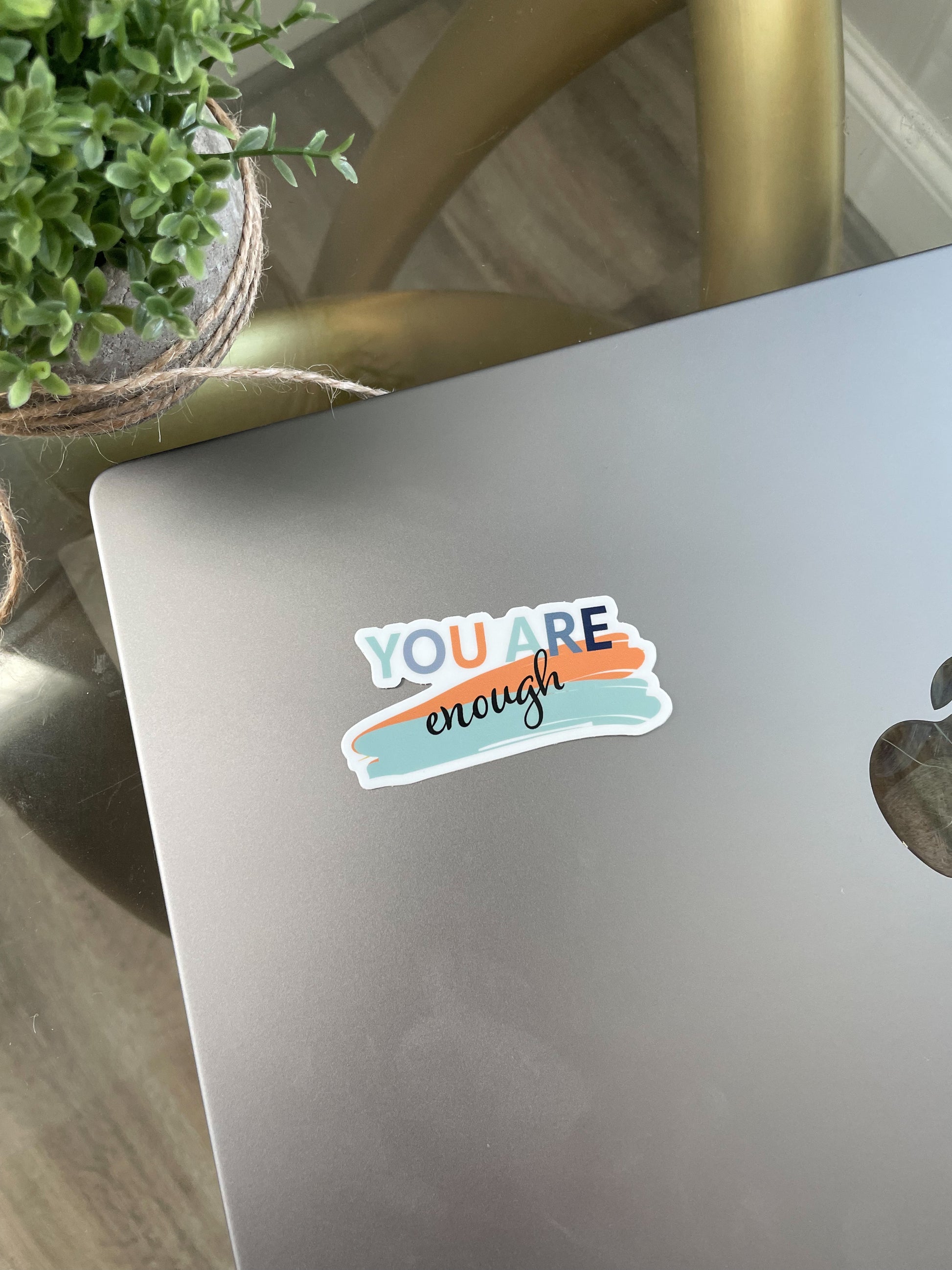 You Are Enough Sticker pictured on laptop